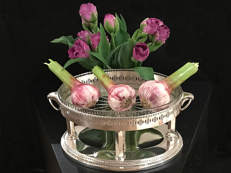 silver plated container with tulips and garlic