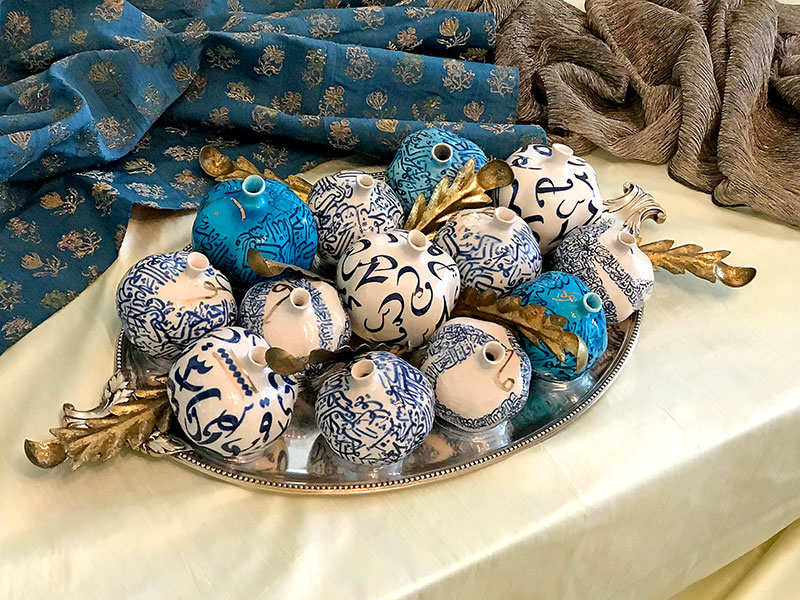ceramic pomegranates in blue and white tones