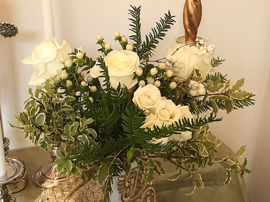 white rose bouquet with greenery
