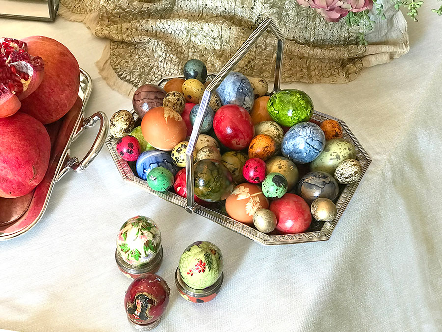 coloured eggs in silver basket