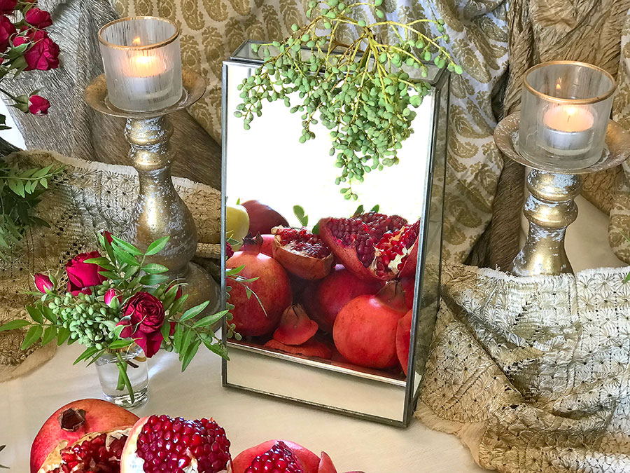 pomegranate reflection in mirror