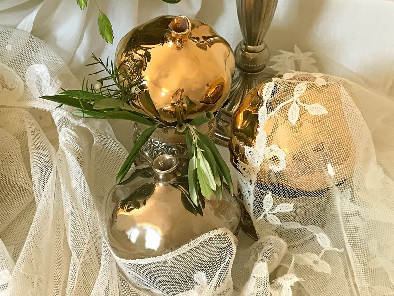 shiny ceramic gold- and silver-finish pomegranates