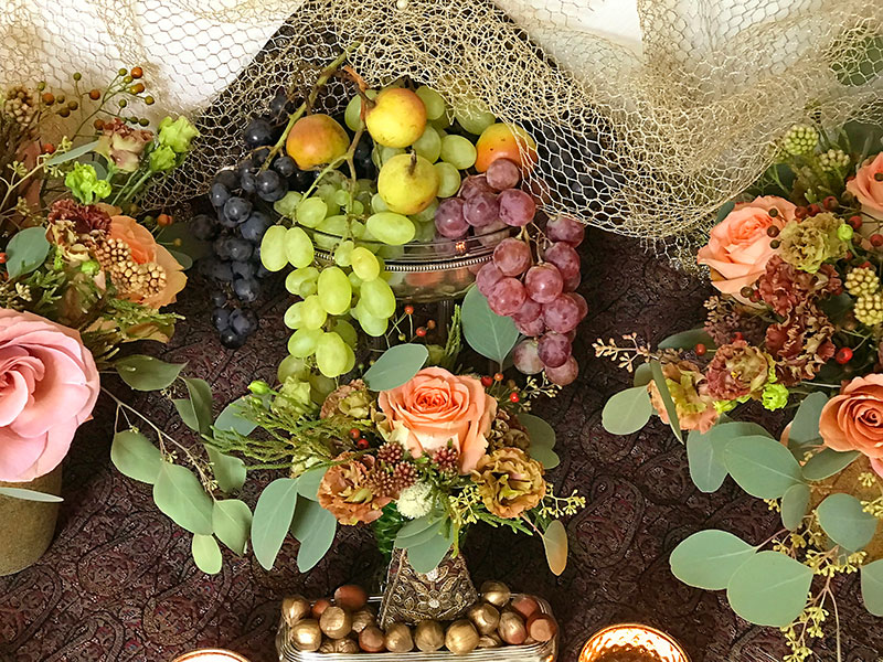 pears, grapes, mesh, and flowers