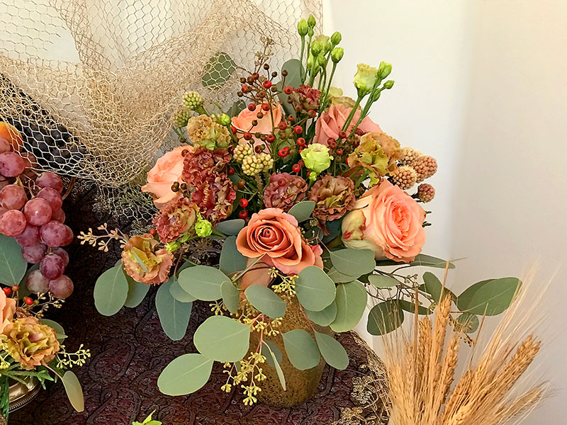 Moab and Country Home roses, Lisianthus Terracotta, Brunia fragarioides, Eucalyptus populus and rose hips
