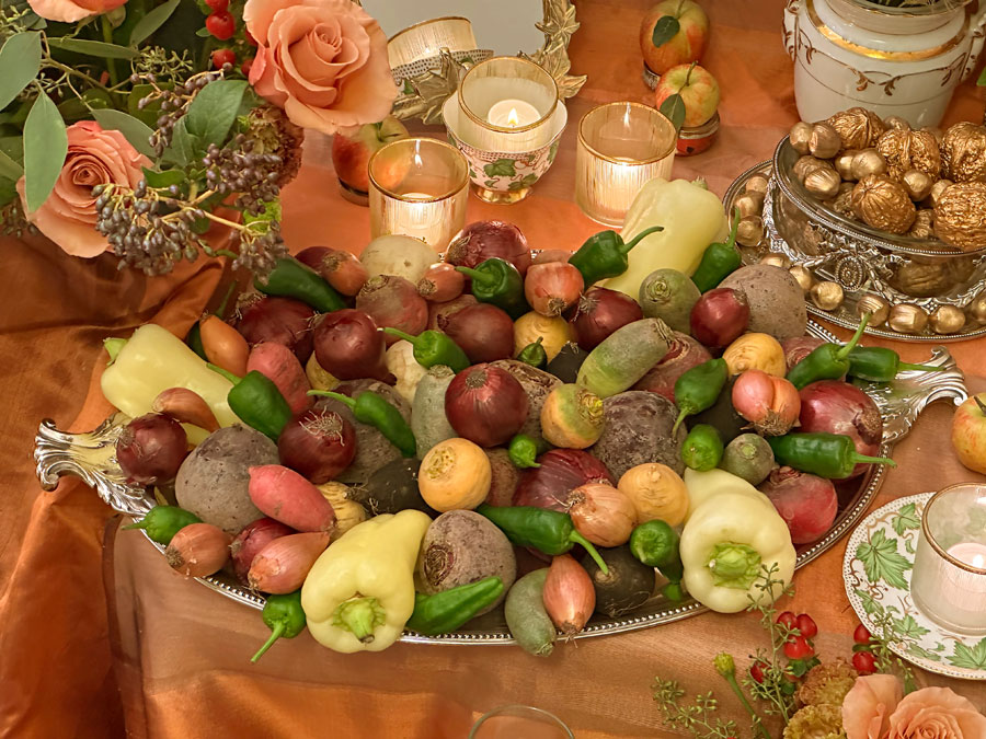 a variety of root vegetables and peppers