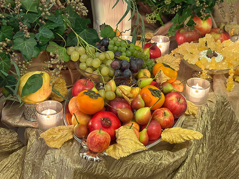 shiny apples, miniature pears, persimmons and pomegranates shiny apples, miniature pears, persimmons and pomegranates